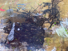 Detail of the painting showing black, gold, and multicolor brush strokes on a textured surface