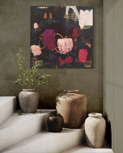 Abstract painting titled "Infinite Shades of Darkness" in a home interior on a dark grey wall