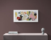 the painting on a wall above a console table with decorative items.