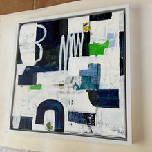 the framed painting seen from the side