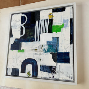 the framed painting seen from the side