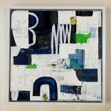the framed painting on the studio floor